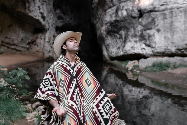 How Can You Style a Poncho for a Professional and Fashion-Forward Appearance?